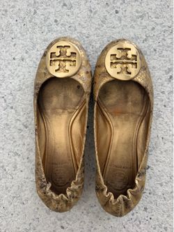 Gold Tory Burch size 6.5