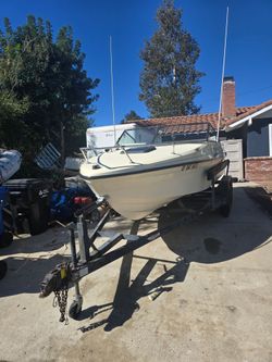 19' Seaswirl with 200 HP engine on tandem axle trailer