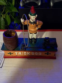 VINTAGE IRON CAST COIN “Truck Dog”
