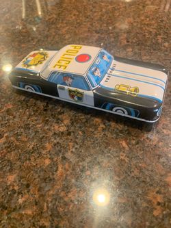 Rare mint condition 1960s tin friction tin police car length 7 inches