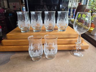 Set of 6 matching Christmas glasses and 1 unique Santa wine glass all for $5