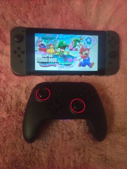 Nintendo switch v2 and  pro remote $250
