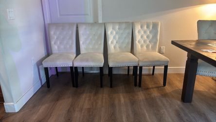 4 Cream color dining chairs