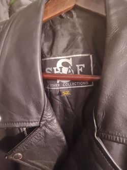 Selling black heavy leather brand new motorcycle jacket and portable mini fan asking $35