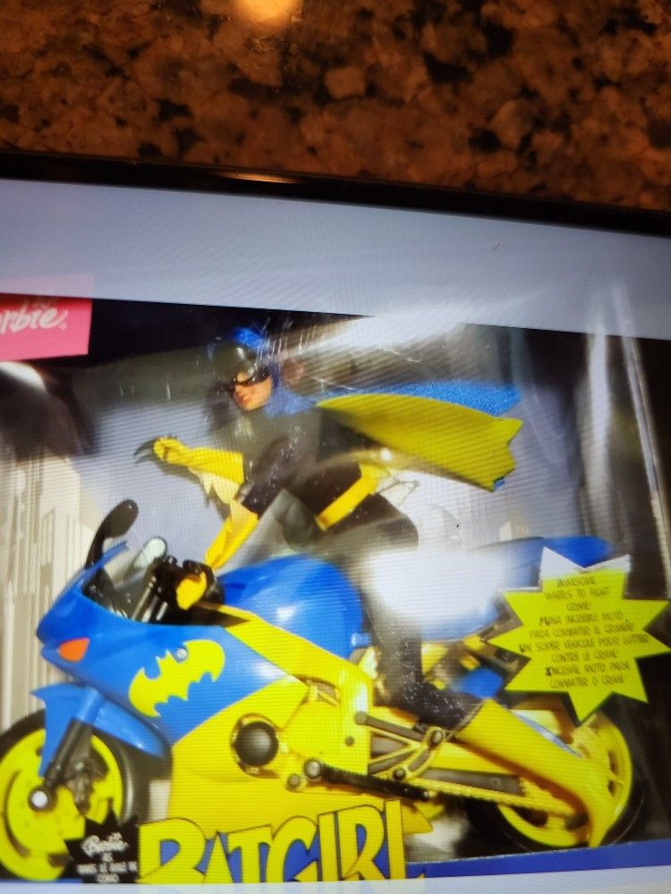 Barbie doll girl on motorcycle , perfect one hundred and fifty dollars