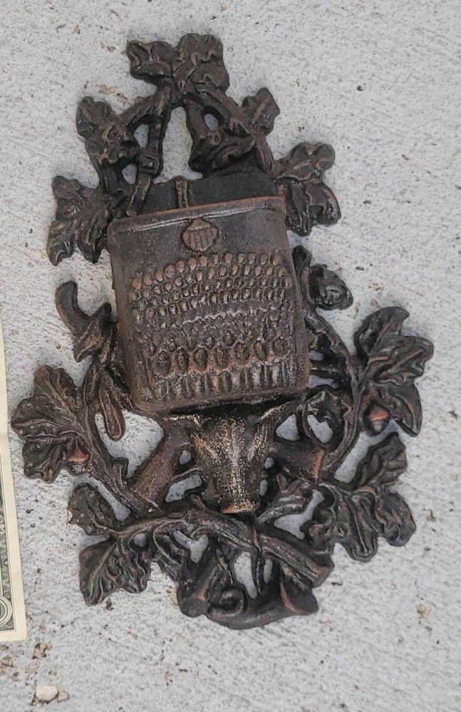 CAST IRON VINTAGE HANGES ON WALL