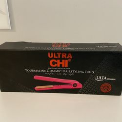 CHI flat iron (brand new in box)
