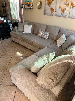 Gorgeous Beige Sectional couch with deep seating