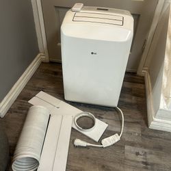LG Portable Air Conditioner Unit On Wheels And Window Exhaust Kit