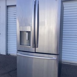 GE fresh door stainless steel refrigerator in good condition, clean and nice, one month warranty, delivery available, dimensions W36-D32-H69