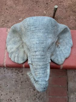 concrete elephant head wall sculpture