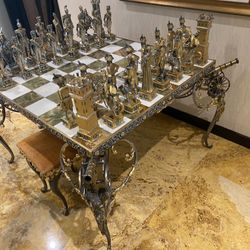 Medieval Style Giant Chess Set with tabl chairs. Handmade in lost wax cast bronze with 24kt gold and silver finish.