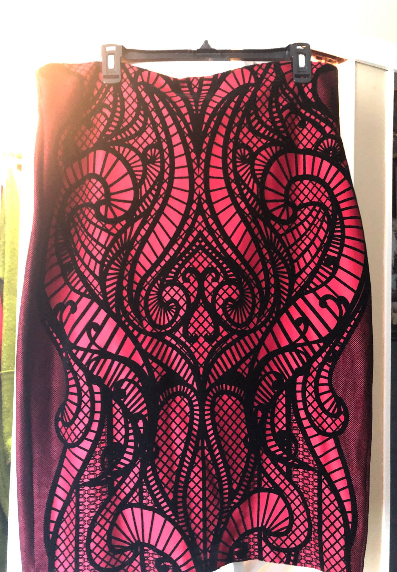 ECI Black lace on a red background