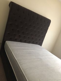 Brown tuft bed