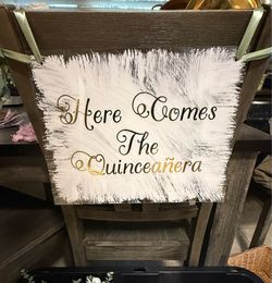 Here comes the Quinceanera sign