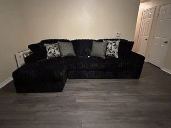 Black fluffy couch