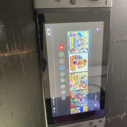  Nintendo Switch with Grey Joy-Cons