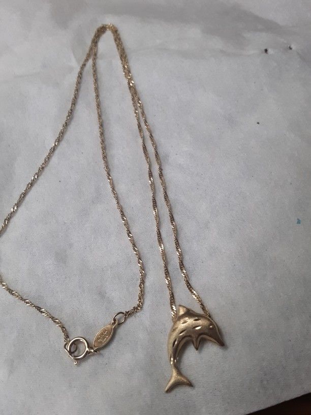 14k Gold Dolphin With Chain.