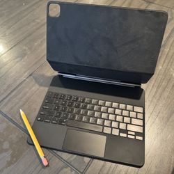 Apple Magic Keyboard and Pencil