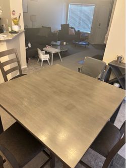 Dining room table with chairs