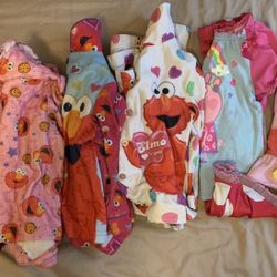 Size 2T Elmo and peppa pig pajamas. 12 pieces (6sets)