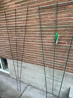 Two metal garden trellis