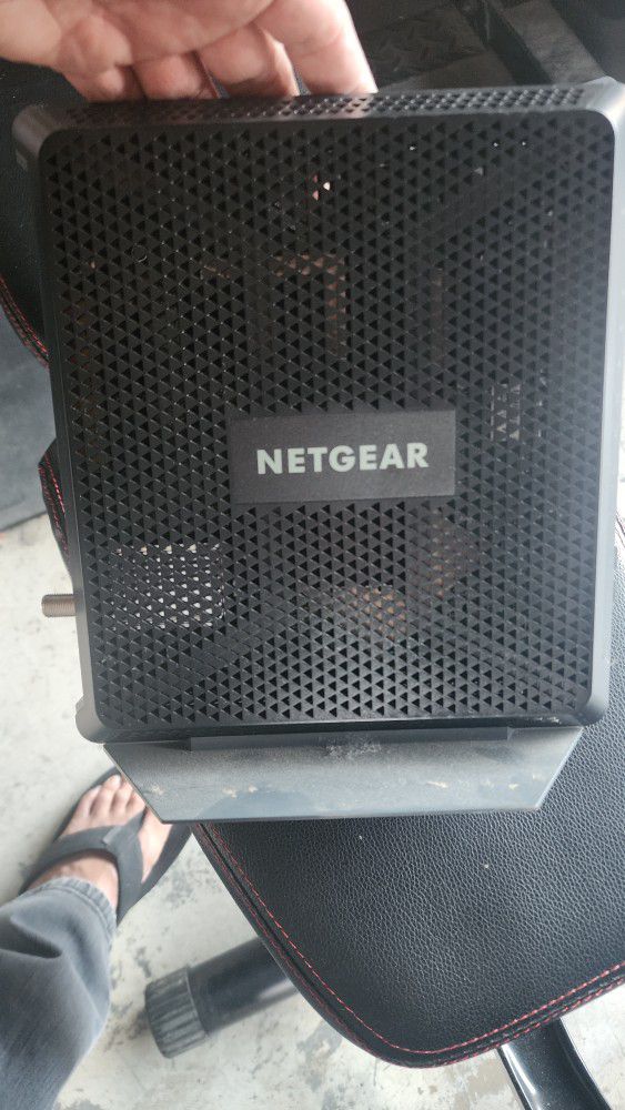 Netgear  Nighthawk Modem+ WiFi Router 


