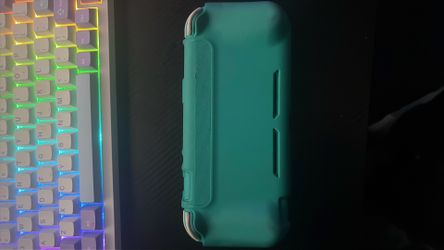 Nintendo Switch Lite – Great Condition With Game