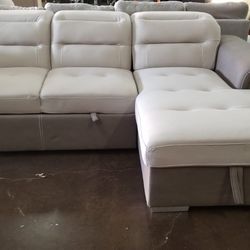 Highend two tone sofa chaise sectional with a pullout bed