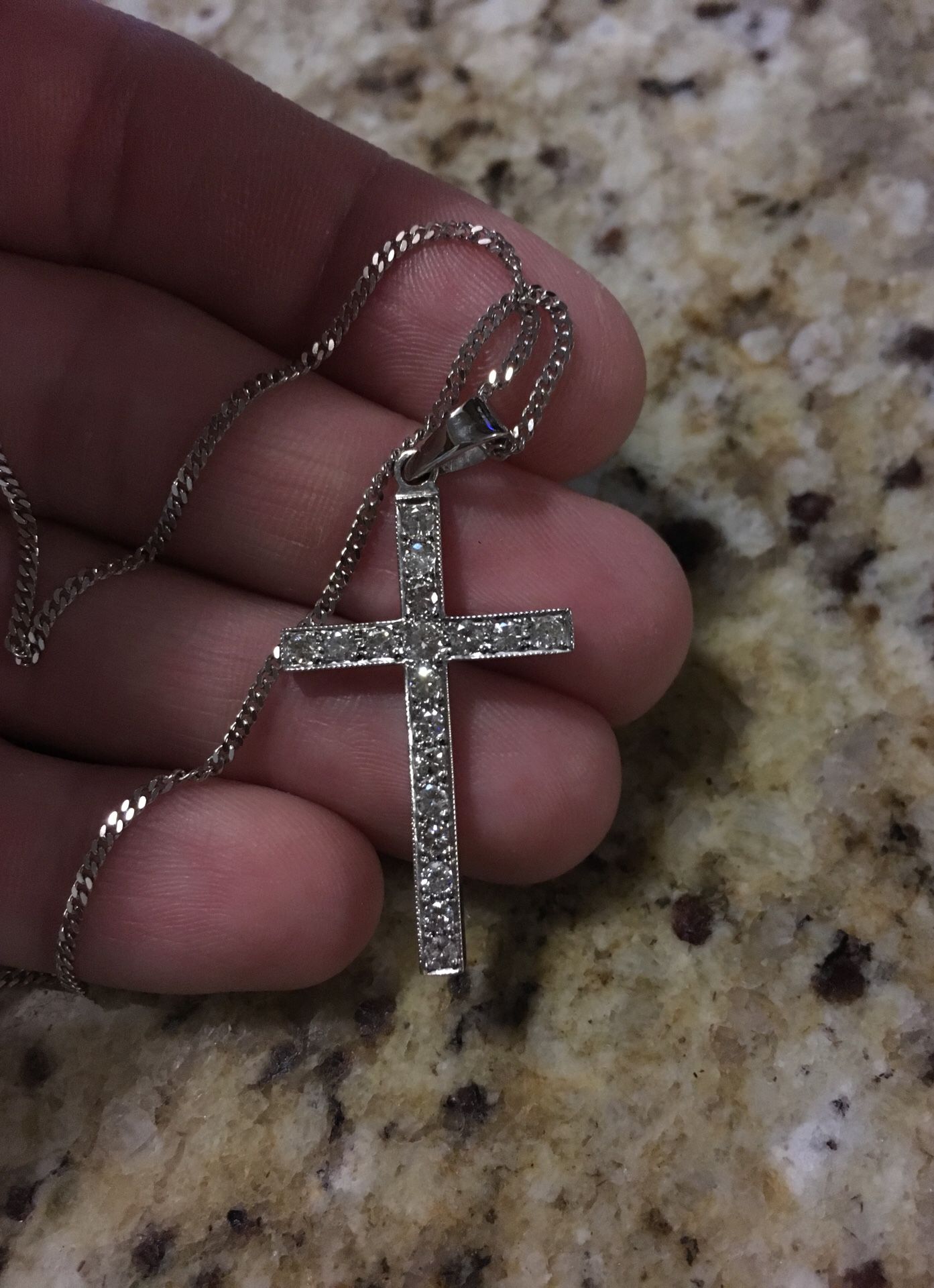 Silver cross with tiny diamond like stones and chain