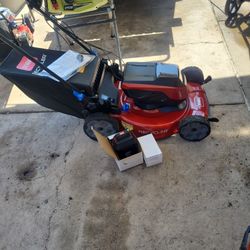 TORO VORTEX RESAICLER 60VOLT LAND MOWER NEW  BATERY END CHARGER INC 