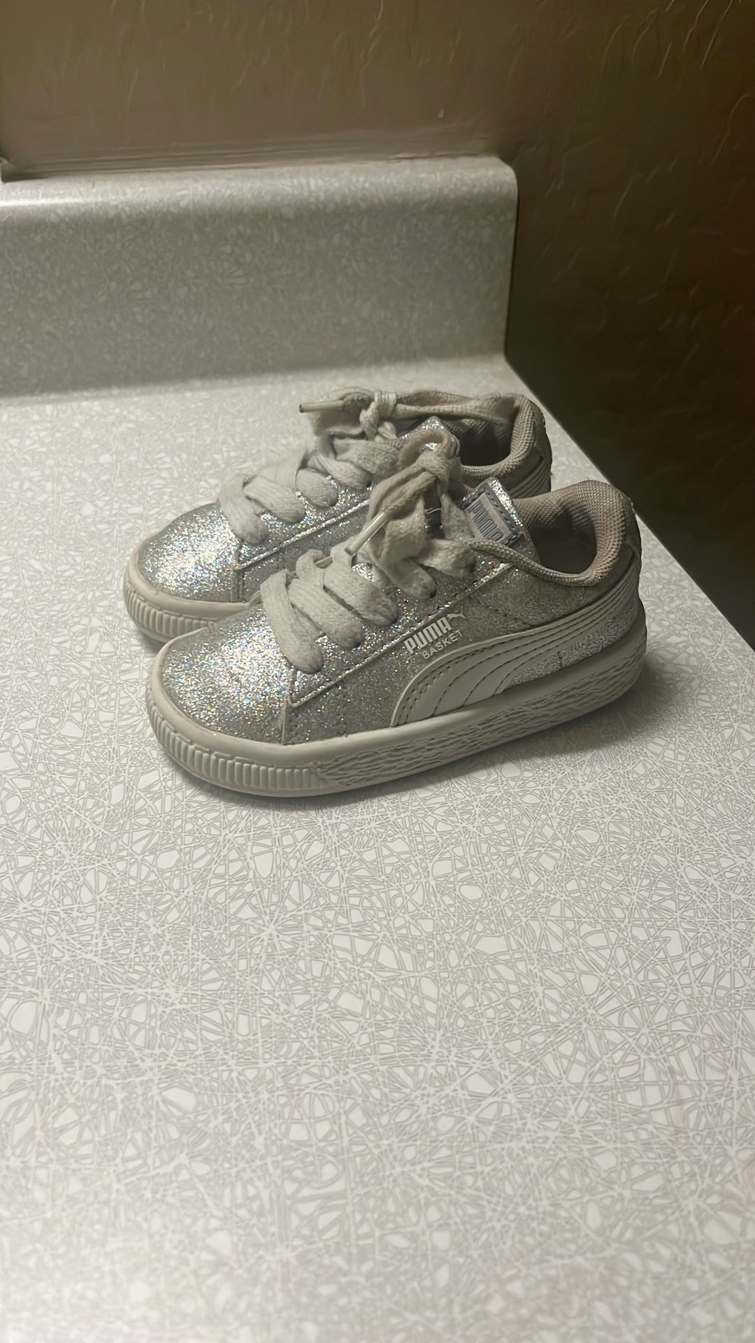 Puma shoes in Silver Glitter. Size 5c