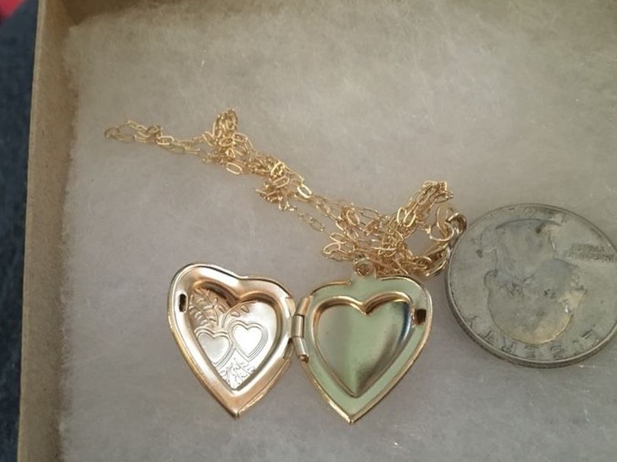 Gold over silver heart locket necklace