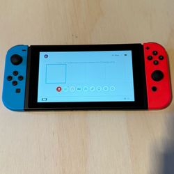 Nintendo Switch HAC-001 Handheld Console 32GB Red/Neon Blue Joy New Condition w/Charger-Case.