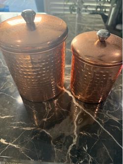 Copper Canister Set, Set of two hammered copper canisters with lids.