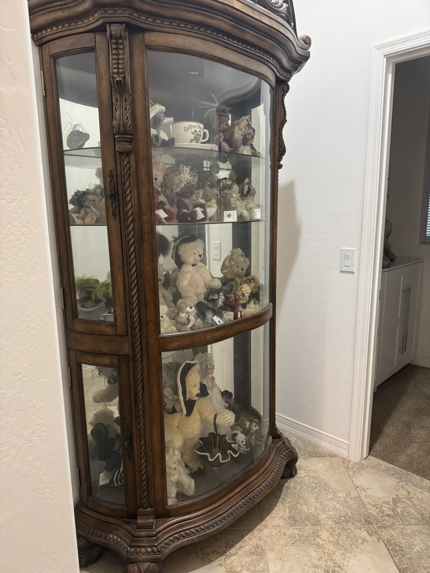 Huge hand curved wood curio cabinet