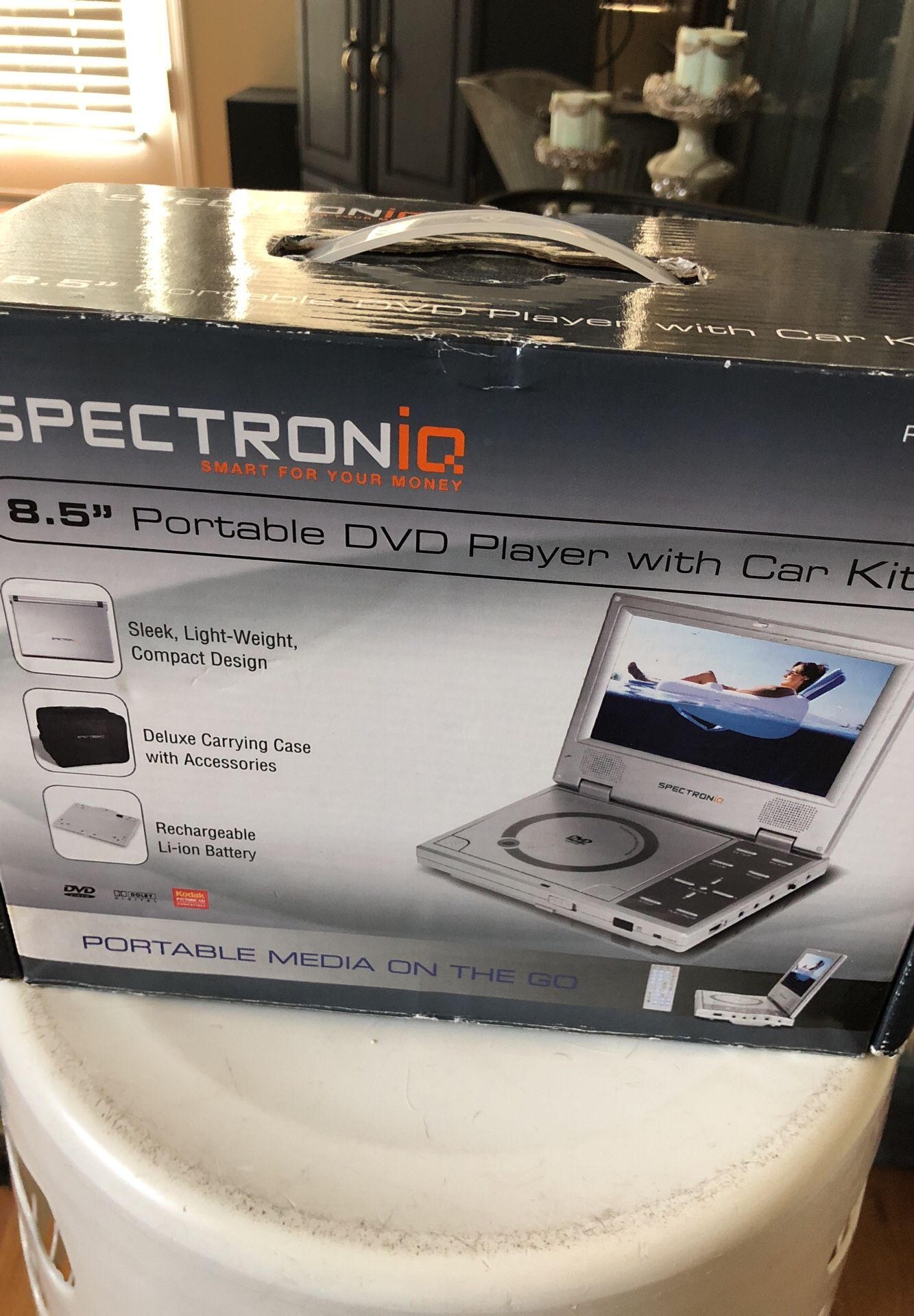 Spectroniq, portable DVD player with car kit.