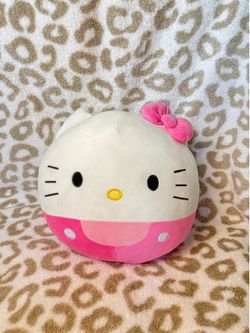 Hello Kitty Squishmallow (Sanrio collab), pink bow and outfit variant.