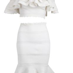 branded suit with ruffles. Alexander McQueen