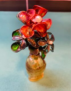 Vintage mini floral arrangement in fish shaped mini Wheaton bottle