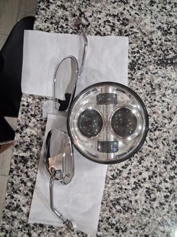 Harley Davidson headlight and mirrors.
