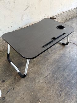 Folding bed table