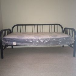 DAYBED.  SOFA DAYBED TWIN SIZE INCLUDING A LIKE NEW MATTRESS 