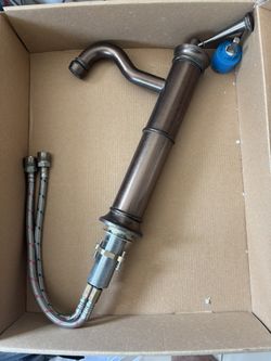 brass kitchen or bathroom faucet