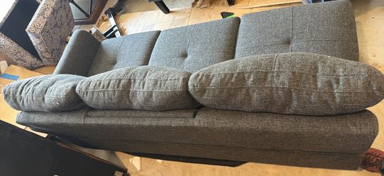 mid-century modern upholstered three-seater sofa