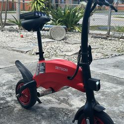 🚲 Jetson Mini Electric Bike (Custom) – $300  Red Jetson mini e-bike with custom chrome pegs — not a stock Jetson feature. This setup has been modifie