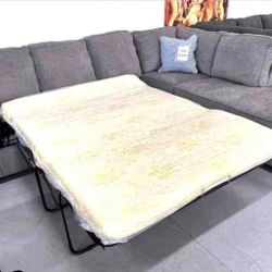 Pull Out Bed Sectional Financing Available By ASHLEY 