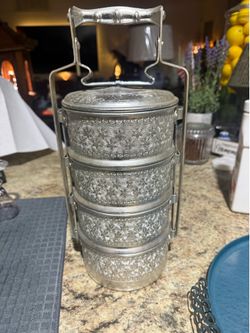 Vintage Liv More Heng Bee Brand stainless steel 4-tier tiffin carrier made in Thailand. Measures approximately 15 inches tall and features four stacka