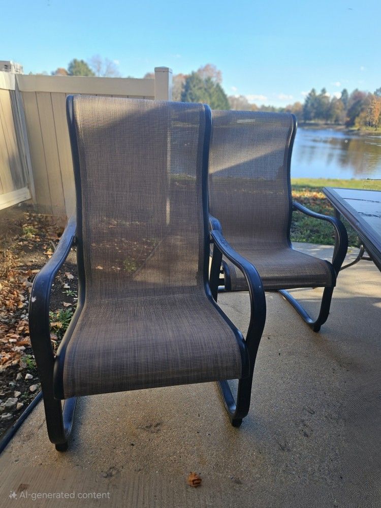 Two Textiline Patio Armchairs.