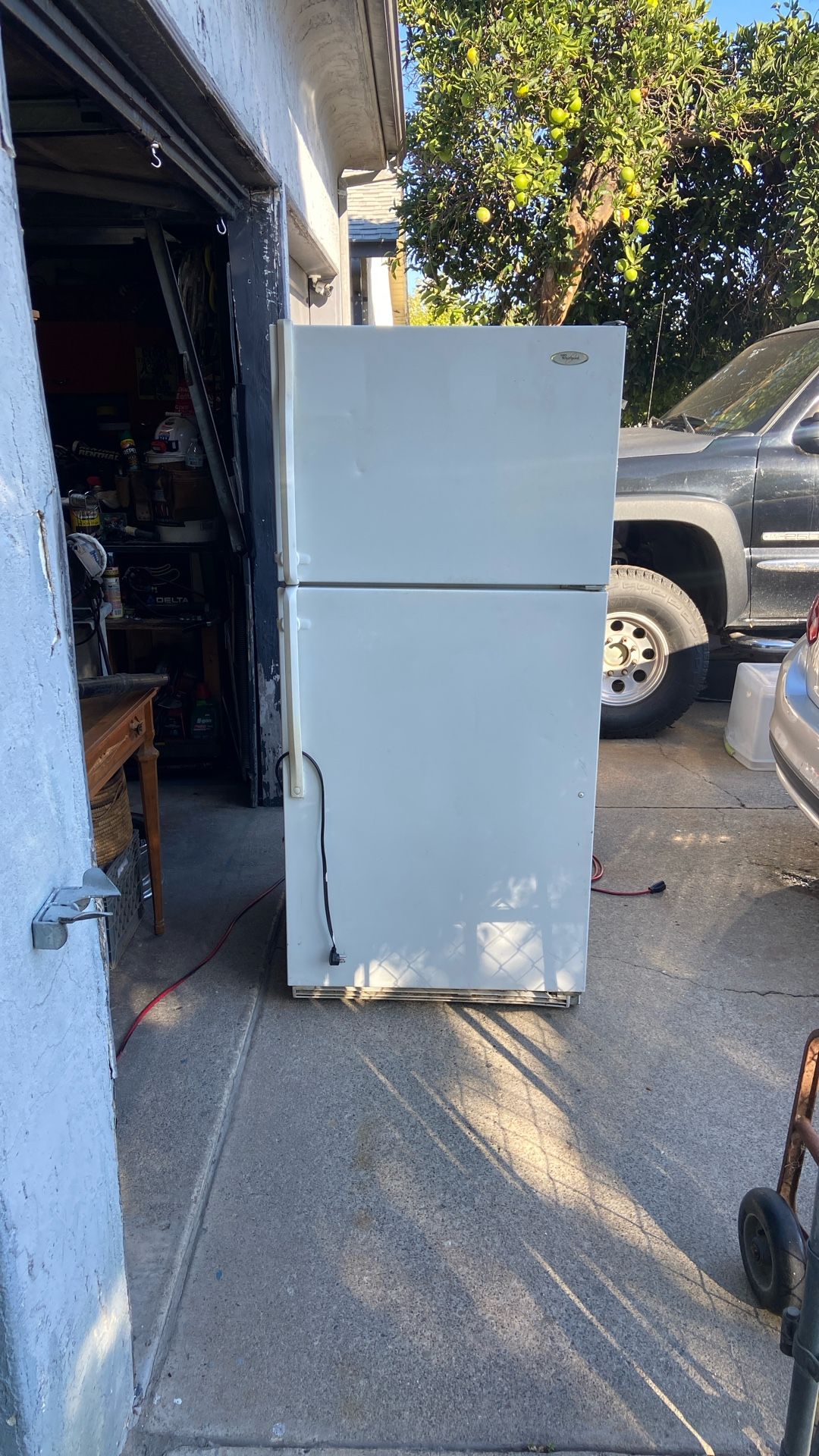 Free refrigerator works would be good for a garage